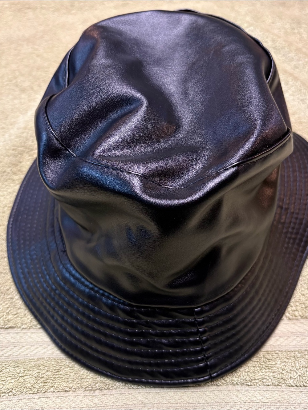 Faux leather bucket hat.
